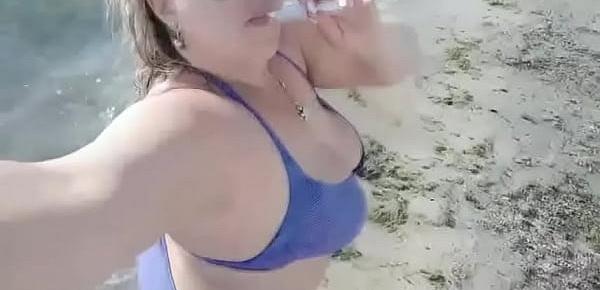  Sexy and hot mommy playing on public beach naked